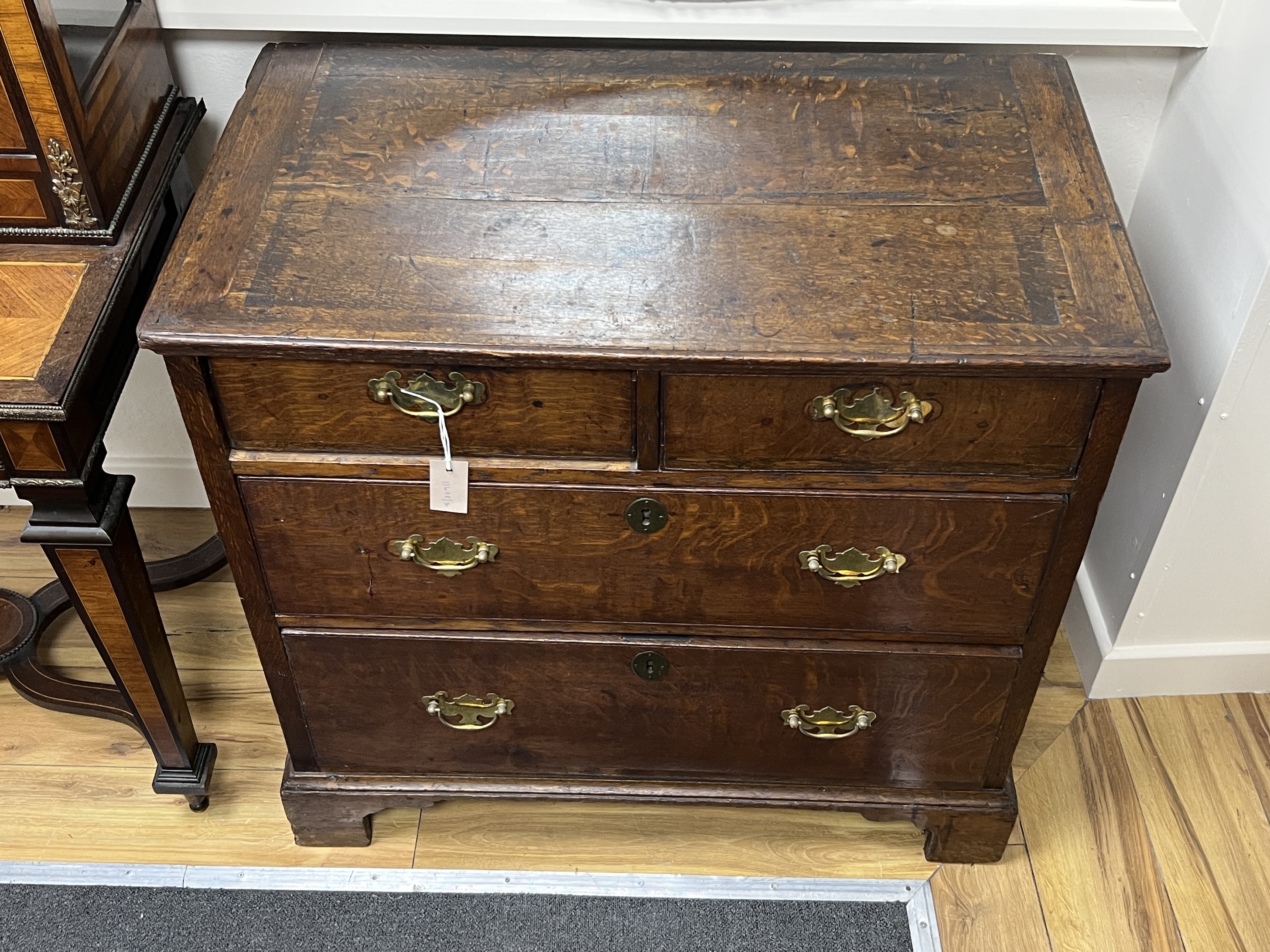 A George III provincial oak four drawer chest, width 90cm, depth 52cm, height 84cm